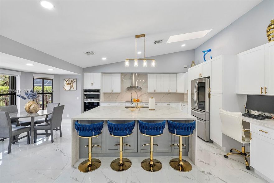 Experience refined waterfront living in this pristine 4 bedroom, 3 bath pool home located in Pine Ridge. Designed with a high luxury feel, this residence welcomes you with sophisticated finishes, open sight lines, and meticulous upgrades throughout. Large format tile flooring enhances the spacious layout, creating a seamless flow from room to room.

The impressive eat in kitchen is a true showpiece, featuring an oversized island with storage, abundant cabinetry, and top tier appliances, all overlooking the dining, living, and family areas perfect for entertaining and everyday living. The expansive primary suite offers a custom walk in closet and a spa style bath complete with an oversized shower and separate soaking tub. A private guest suite can easily serve as a second primary, featuring its own walk in closet and full bath.

With over 3,100 square feet of living space, this exceptional waterfront home provides the ideal setting for both relaxed family living and upscale entertaining.