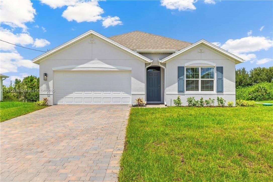 Beautiful 4-bedroom, 2-bathroom home with stunning lake views, ideally located near State Road 29 and State Road 82, with quick access to Lehigh Acres, Fort Myers, and Immokalee. Nestled in a peaceful LaBelle neighborhood, this spacious home features open living areas, modern finishes, and a large backyard perfect for outdoor enjoyment. A move-in ready opportunity you don’t want to miss!