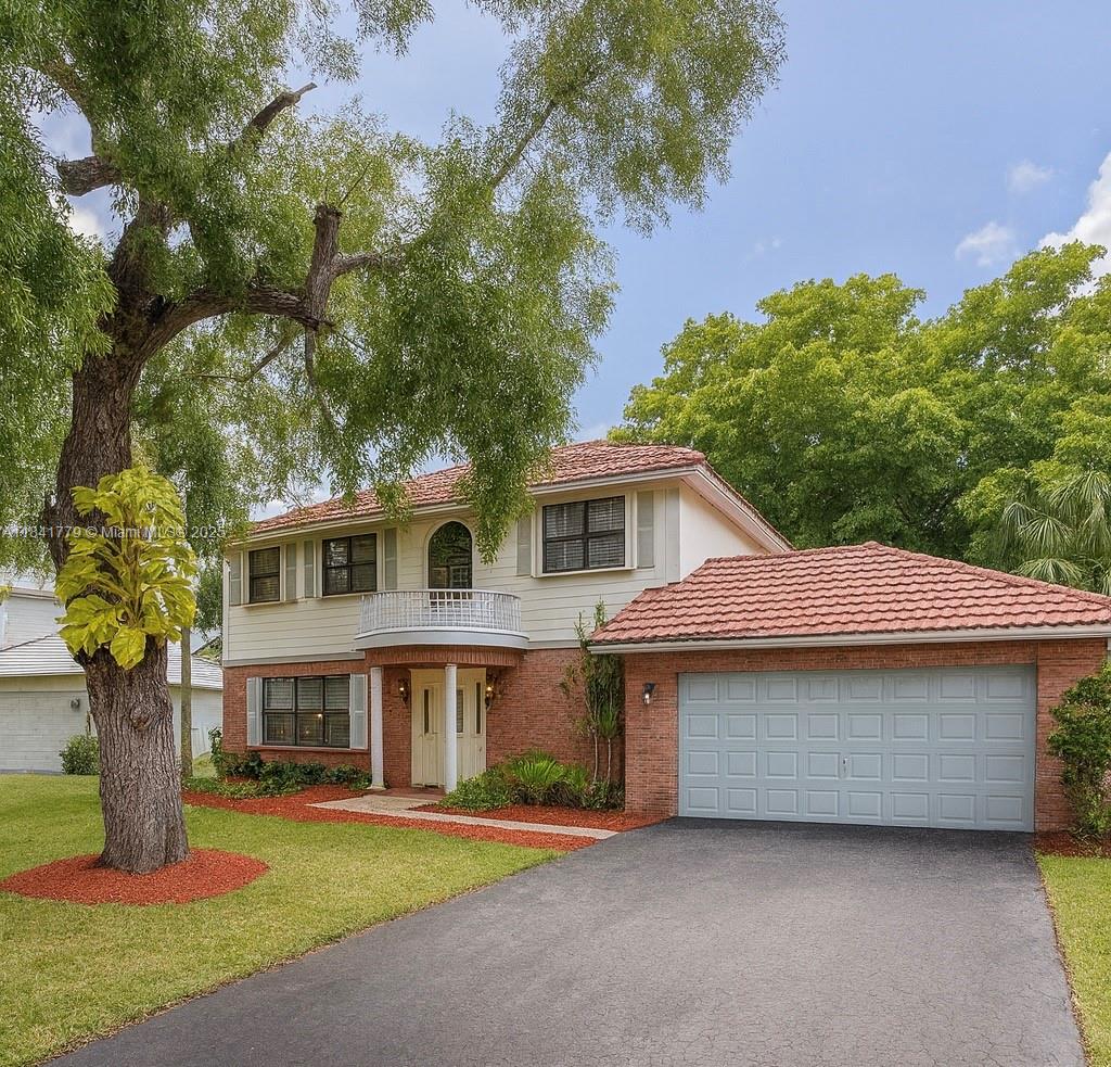 Nestled in the heart of Davie’s highly desirable Shenandoah community, this freshly painted & updated 4-bedroom, 2.5-bath residence offers comfort and functionality. Downstairs features a spacious living room, family room and dining area ideal for both entertaining and everyday living. All four bedrooms are generously sized, with ample closet space and lots of natural light throughout. Step outside into your private oasis with an expansive, lushly landscaped backyard with more than enough room for a pool. Enjoy close proximity to Shenandoah Park’s playgrounds, splash pad, and sports courts, along with top-rated schools, convenient shopping, and quick access to major highways.