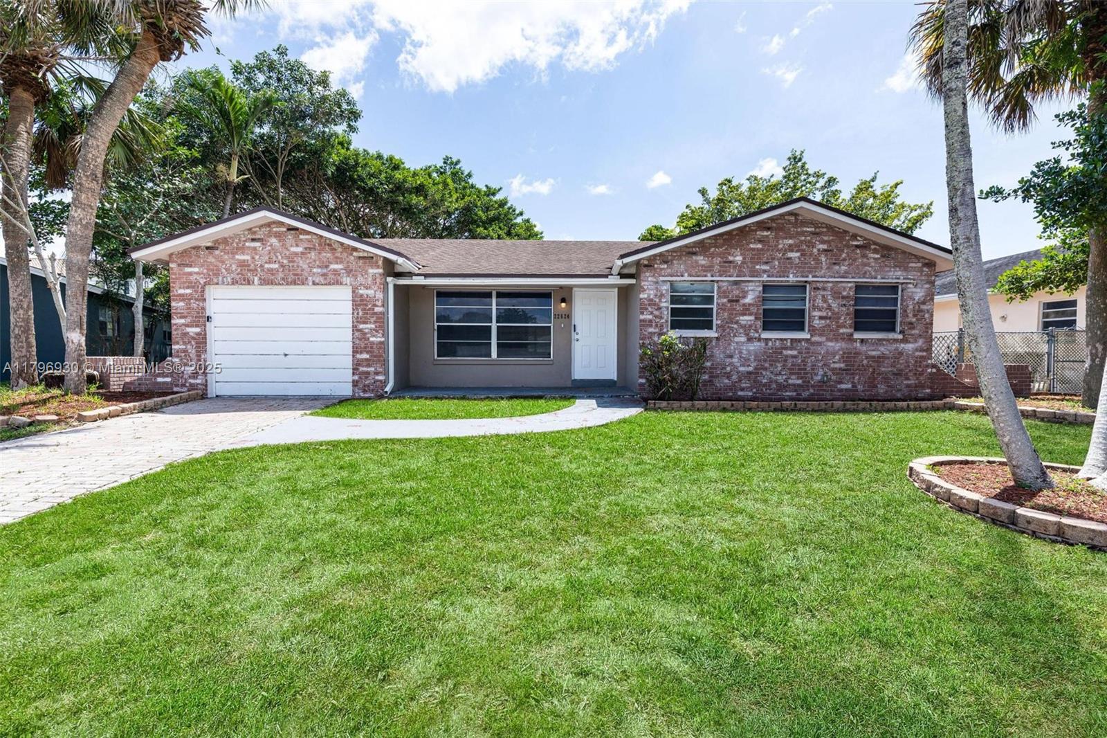 Charming three-bedroom, two-bathroom home with a one-car garage located in beautiful Boca Raton. This home features tile flooring throughout, a stylish kitchen with laminate countertops, stainless steel appliances, and updated cabinetry. Step out back to enjoy a serene view of a beautifully mature tree—perfect for relaxing or entertaining. Conveniently located near top-rated schools, shopping, and dining options.