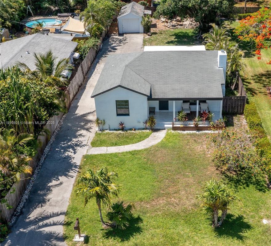 Newly remodeled Delray Beach gem on a 7,500 sq ft corner lot at 246 NE 13th St. Features include a modern kitchen, marble floors, updated bath, stainless steel appliances, and a striking marble fireplace. Rare detached garage, long driveway, and guest parking next to a playground. Ample parking available for RVs, boats, or commercial vehicles. Spacious patio ready for a Florida room—includes two 8-ft hurricane sliders. Room for pool or addition; $16K credit for impact windows/doors. Walk to Atlantic Ave, Pineapple Grove, and PopStroke. Minutes to the beach. Optional plans for a 3,600 sq ft new build with pool (comps ~$2.8M) available. Move-in ready with major upside! ¡¡NO HOA!! - bring your boat, RV, or Airbnb vision. Best price in the area!!