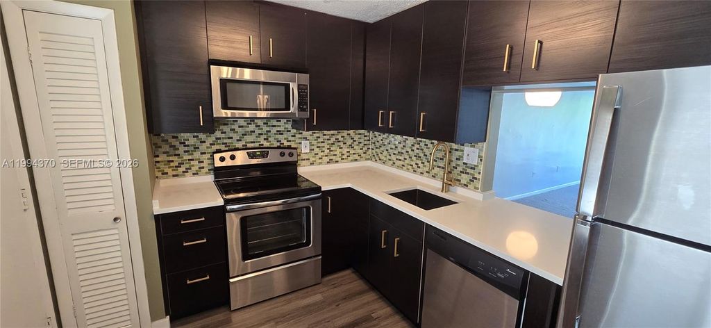 Photo of 1201 NE 191st St #G306, Miami, FL 33179 (MLS # A11994370)