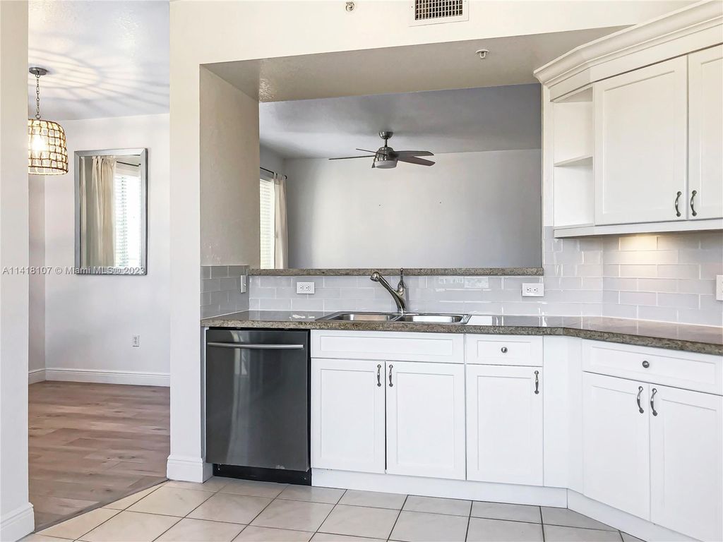 Photo of 11018 Legacy Dr #204, Palm Beach Gardens, FL 33410 (MLS # A11418107)