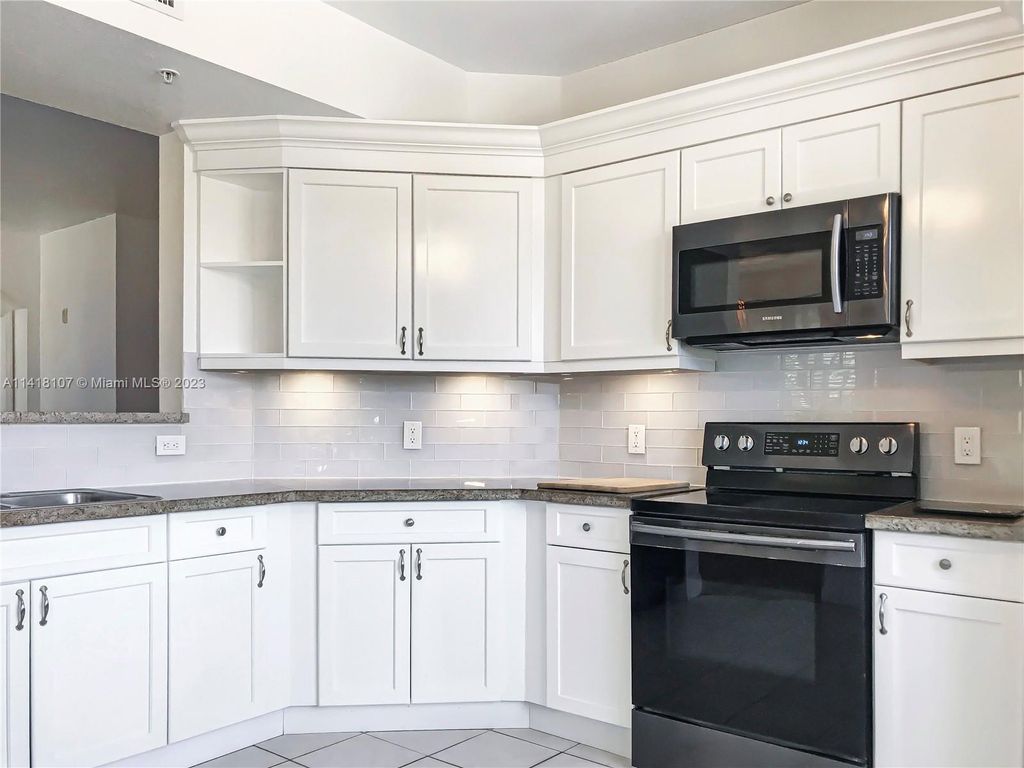 Photo of 11018 Legacy Dr #204, Palm Beach Gardens, FL 33410 (MLS # A11418107)