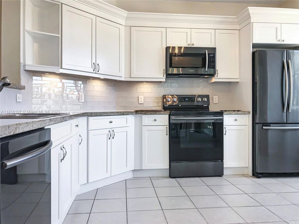 Photo of 11018 Legacy Dr #204, Palm Beach Gardens, FL 33410 (MLS # A11418107)