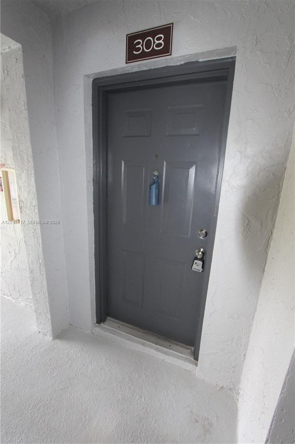 Photo of 11211 W Atlantic Blvd #308, Coral Springs, FL 33071 (MLS # A12013417)