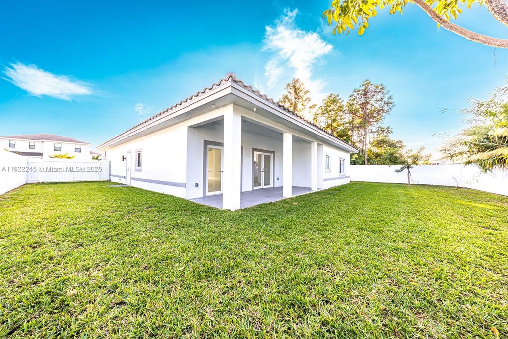 Photo of 12901 SW 266th Ter, Homestead, FL 33032 (MLS # A11922245)