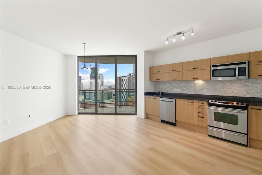 Fully renovated property in immaculate condition! This 2-bedroom, 2-bath renovated condo offers sweeping skyline and amazing water views; Offering a modern style combination of elegance and comfort some of the features of the property include a walk-in closet, 2 spacious balconies with water views, contemporary kitchen featuring granite countertops, stainless steel appliances, & a brand-new refrigerator and new dishwasher. Some of the renovations of the property include brand new floors. custom paint job, new doors, new washer heat, appliances and the list goes on. Enjoy resort-inspired amenities in the soon-to-be FAENA Brickell District including 24-hour concierge service, valet parking, an infinity pool, a state-of-the-art gym, steam, and sauna. HOA covers water, basic cable, and internet.Just a 5-minute walk to Brickell City Centre, and steps from Metro Mover and Quick access to I-95 and only 15 minutes to Miami International Airport.