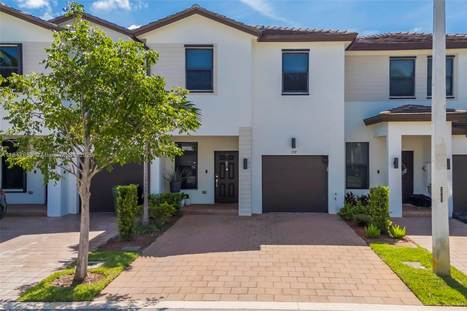 Beautifully updated 4 bed/3 bath townhouse in highly desirable West Pembroke Pines! This spacious unit features tile flooring throughout, remodeled kitchen and bathrooms, and a bright, open layout. Garage has been partially converted into a flexible space—perfect for a home office, playroom, or workout space. Enjoy modern upgrades, a functional floor plan, and a prime location in a family-friendly community. Located near top rated schools, major highways, shopping, and dining. Don't miss this move-in ready gem!
