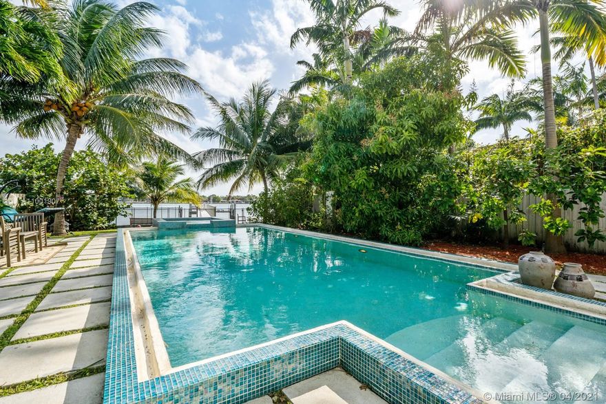 Extraordinary two story waterfront home built in 2015 with the largest rooftop terrace on the Island. Enjoy sunrises and sunsets on this 360 breathtaking panoramic views of Miami waters and Skyline. This 4 bed/2.5 bath home, features high ceilings and endless natural light upon entry, high-impact windows and doors, modern kitchen w/ Quartz counter tops and porcelain floors throughout. MASSIVE LOFT STYLE master suite w/ 1,600sf+ located on the entire 2nd floor, water views on both sides, walk in closet and private terrace. Backyard surrounded by Palm trees, pool, hot tub and a beach play area. The boaters paradise on open waters w/ 50 ft of water frontage, new seawall, dock, boat lift and room for jet skies. Minutes to the beach, 5 star restaurants and shopping. Total area 5,154 sf.