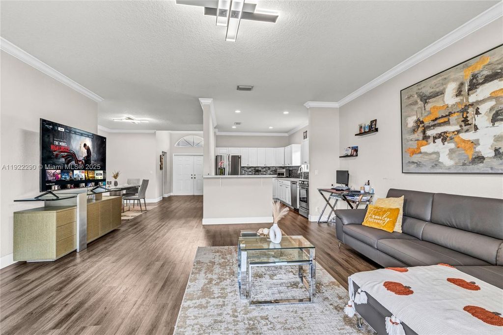 Photo of 7602 NW 99th Ter, Tamarac, FL 33321 (MLS # A11922290)