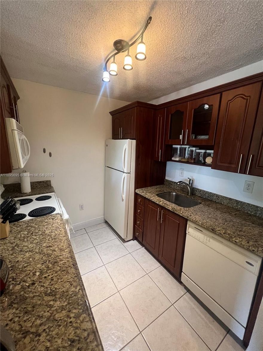 Spacious 1-bedroom, 1-bathroom condo in the desirable Palm Cove community. This 2nd floor unit is in excellent condition. Tile flooring. Washer and dryer in unit. Prime location just one block from Miami Dade College, with easy access to shopping centers and major highways. The building has a swimming pool and one reserved parking space with plenty guest parking.