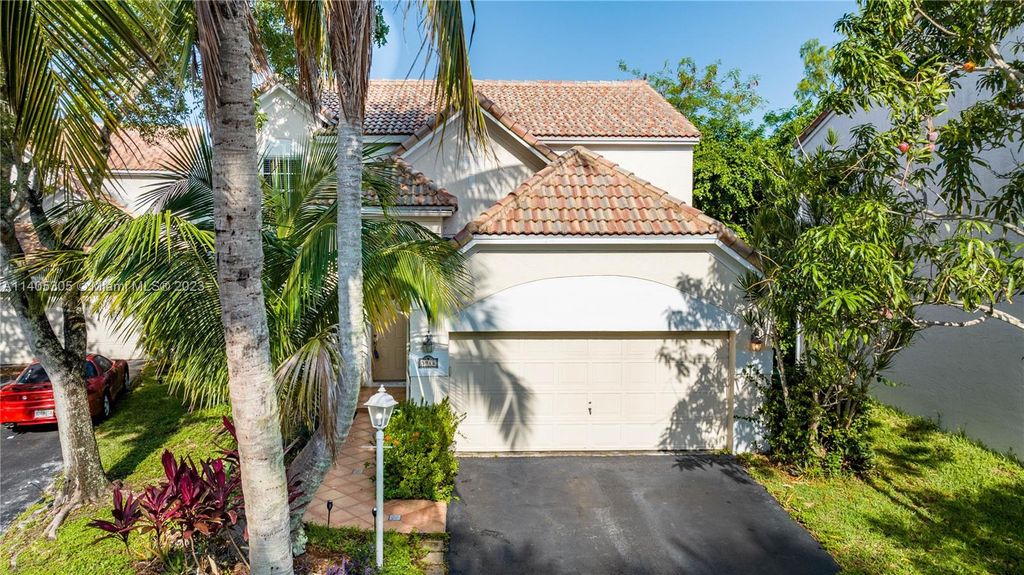 Photo of 3946 Jasmine Ln, Coral Springs, FL 33065 (MLS # A11405305)