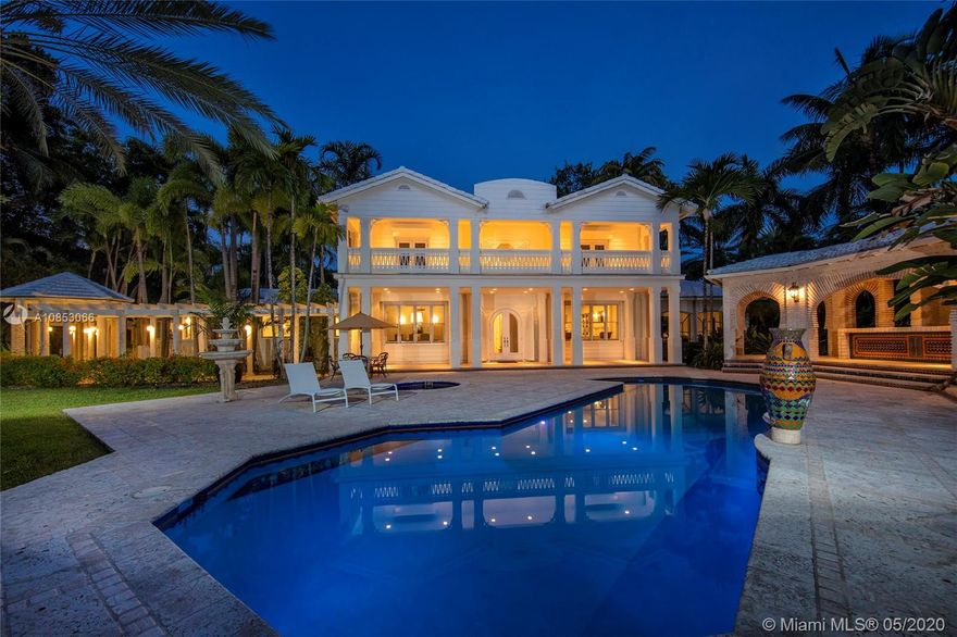 Located on exclusive guard-gated Star Island, this magnificent Bayfront estate rests upon an impressive 58,332 SQ FT corner lot w/240’ of sparkling waterfront & unobstructed views to Biscayne Bay & the Downtown Miami skyline. The estate boasts a beautiful 2-story, 3BR/6+1BA Floridian-style villa w/open verandas that face the bay, rich hardwood & marble floors, arched doorways, living room w/fireplace, private dining room, graceful piano room & a large kitchen all with water views. At the front of the home is a separate & private 3BR/2+1BA Guest House. The lushly landscaped grounds feature tropical foliage, palms, a resort-style pool/spa, private dock & amazing sunset views. This estate is truly one-of-a-kind. Location, lot size & amenities this residence is like no other on Star Island.