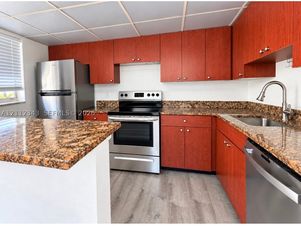 Photo of 1477 SW 24th Ct #5, Fort Lauderdale, FL 33315 (MLS # A12112343)