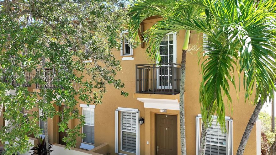 Stunning 2BR/2.5BA corner townhouse in the highly desired gated Cobblestone community! This bright and spacious home offers high ceilings, abundant natural light, and a private paved patio perfect for entertaining. Enjoy ceramic tile throughout the first floor, elegant wood floors upstairs, and a stylish staircase. The modern kitchen features granite countertops, stainless steel appliances, and a new washer/dryer. The master suite boasts a balcony with impact French doors for extra peace of mind. Community amenities include a clubhouse, heated pool, fitness center, playground, scenic walking paths, and 24-hour security. Ideally located near A-rated schools, I-75, major malls, Whole Foods, Costco, and top restaurants. A must-see!