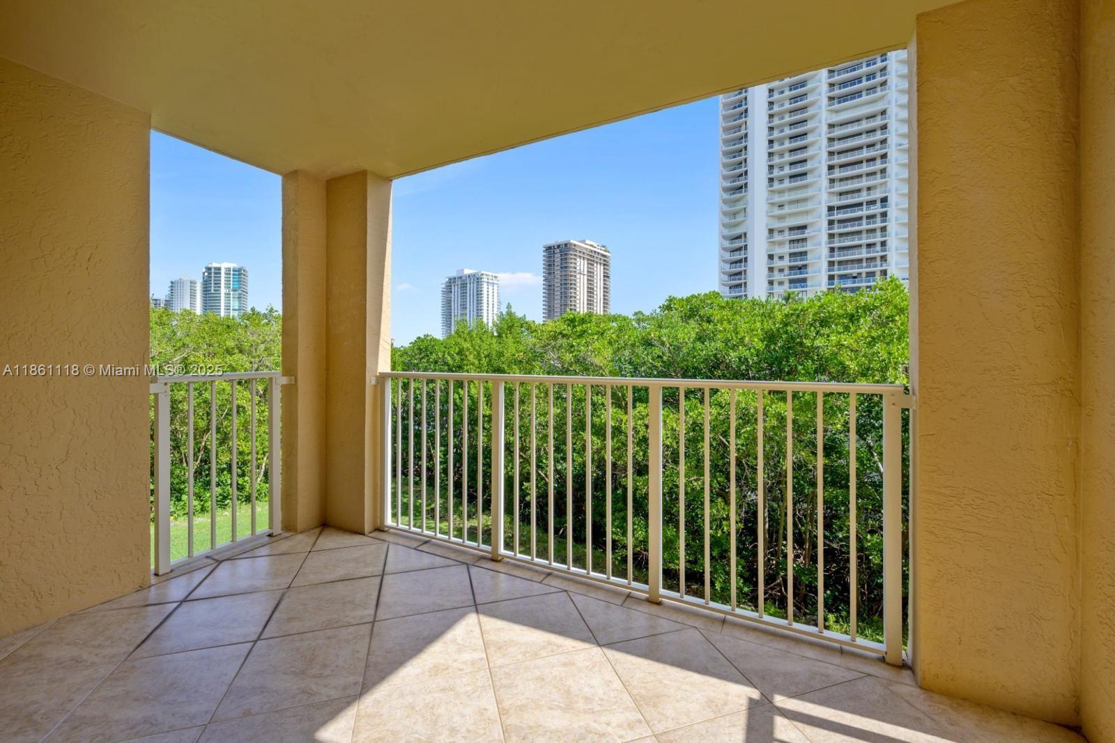 BEAUTIFUL 3 BEDROOM 2 CONDO IN DESIRABLE YACHT CLUB AT AVENTURA. STAINLESS STEEL APPLIANCES. GRANITE COUNTERTOP AND VANITIES. PEACEFUL AND SERENE. WASHER AND DRYER INSIDE THE UNIT. ALL VYNIL ENGINEERED MODERN FLOORING THROUGHOUT.LOVELY VIEWS, MODERN AND COMFORTABLE. ENJOY ALSO ALL THE LUXURY AMENITIES THE YACHT CLUB CONDOMINIUM HAS TO OFFER: GYM, HEATED POOL, JACUZZI, TENNIS, RACKETBALL, BASKETBALL, BUSINESS CENTER , AND SO ON..JUST ACROSS THE STREET FROM A GORGEOUS TRAIL FOR STROLLING OR JOGGING, BEAUTIFUL BEACHES FIVE MINUTES AWAY AND PLENTY OF PARKS TO AMUSE.