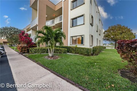 Photo of 7264 S Devon Dr #112, Tamarac, FL 33321 (MLS # A12002853)