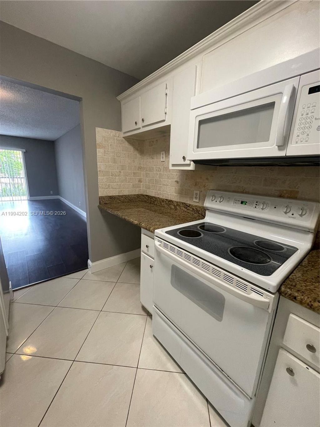 Photo of 5961 N Falls Cir Dr #309, Lauderhill, FL 33319 (MLS # A11994202)