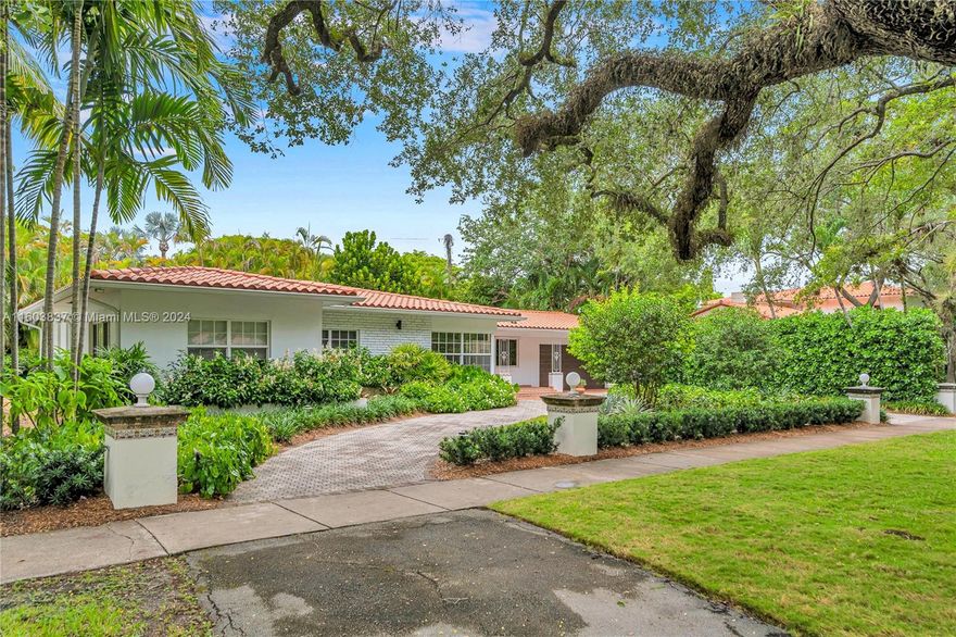 WELCOME TO THIS CHARMING ONE-STORY HOME ON PRESTIGIOUS GRANADA BLVD IN CORAL GABLES. LIGHT AND BRIGHT REMODELED LIVING AND DINING AREA OVERLOOKS COVERED POOL AND PATIO. COMPLETELY UPDATED CHEF'S EAT-IN KITCHEN WITH STAINLESS STEEL APPLIANCES AND A HAND-CRAFTED LIVE OAK ISLAND. TWO NEWLY RENOVATED BATHROOMS AND A NEW ROOF! SPACIOUS BACKYARD WITH LARGE POOL AND PATIO AREA ARE PERFECT FOR ENTERTAINING. PROFESSIONALLY MADE LANDSCAPING BY STEVE BLAUM GIVES YOU EXTRA PRIVACY AND BEAUTY. WALKING DISTANCE TO 2 PARKS AND CORAL GABLES GRANADA COUNTRY CLUB.