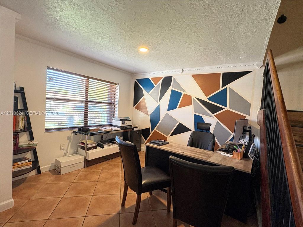 Photo of 5424 Gate Lake Rd #5424, Tamarac, FL 33319 (MLS # A12010324)