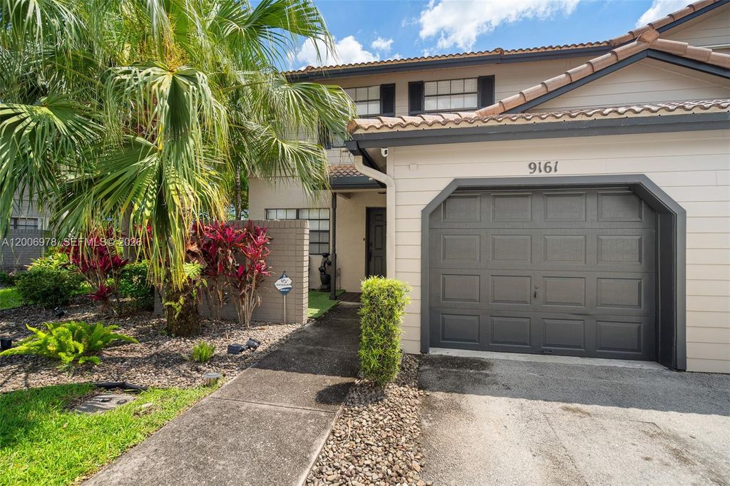Photo of 9161 Vineyard Lake Dr #9161, Plantation, FL 33324 (MLS # A12006978)