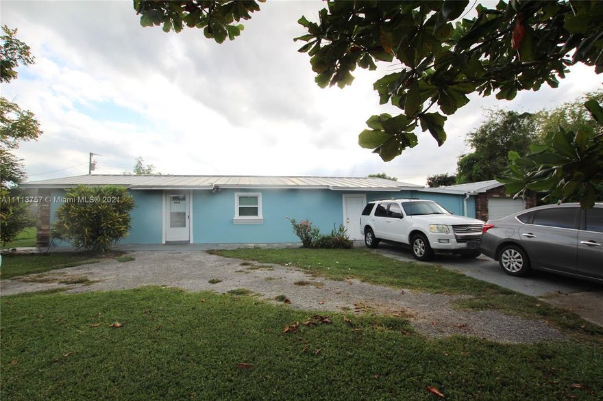 OKEECHOBEE HAMMOCK - CBS 4/2 with a fenced in back yard. The home has had updates for the bathrooms, new septic tank and drainfield in 2020, new well pump, new water filtration system, new A/C and new metal roof all in 2020. The home is very spacious in a good area.