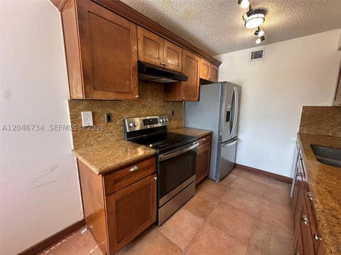 Photo of 4990 NW 97th Pl #314, Doral, FL 33178 (MLS # A12046734)