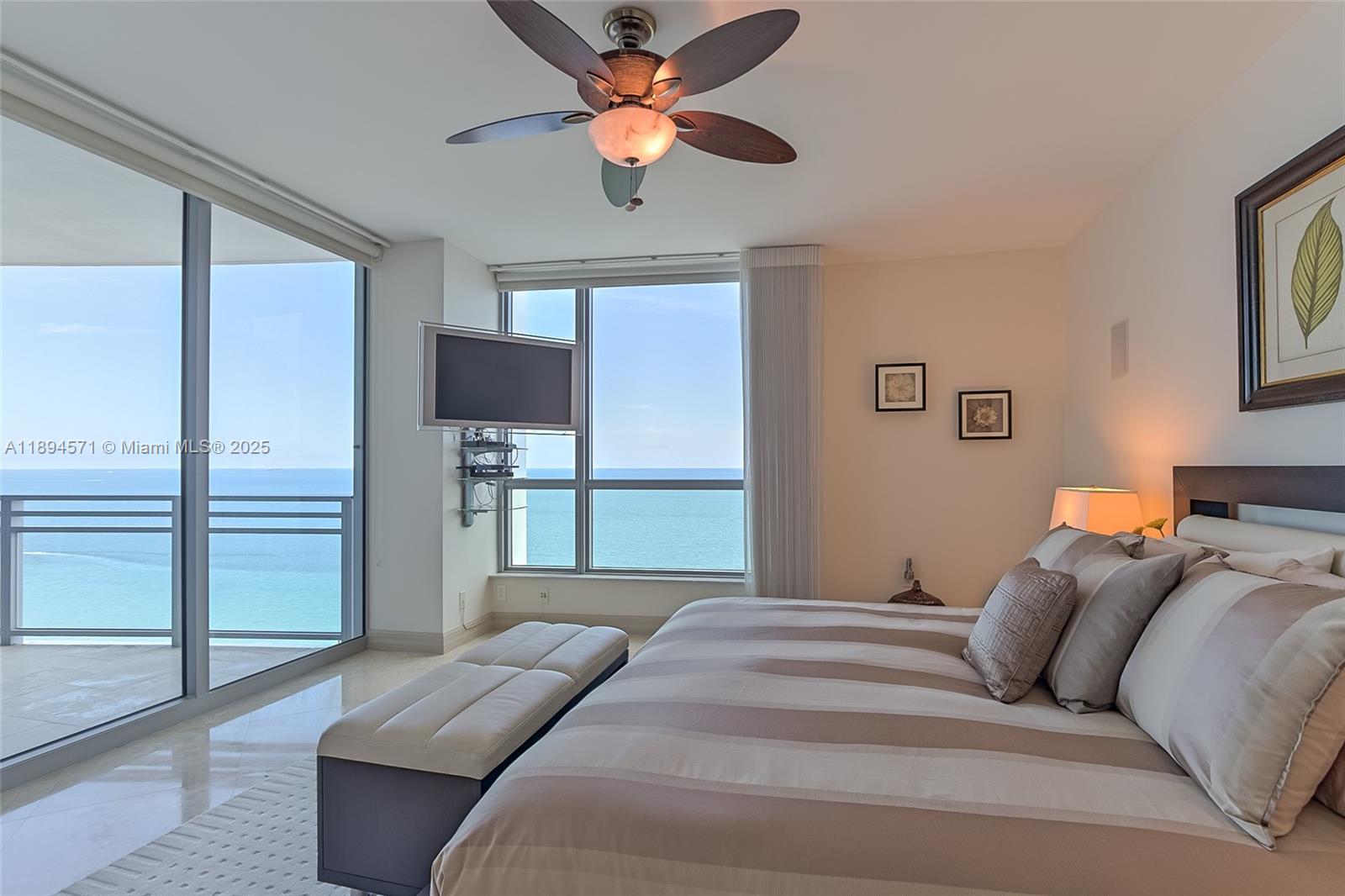 This exquisite direct oceanfront residence features two king-size beds and one queen-size bed across three spacious bedrooms. Impeccably designed, it boasts a private elevator lobby, gleaming marble floors, recessed lighting, an open-concept gourmet kitchen, and custom walk-in closets. Enjoy two expansive balconies with breathtaking views. Resort-style amenities include a private surround-sound theater, state-of-the-art fitness center, entertainment lounge, and a heated saline pool with spa. Indulge in world-class services at the neighboring Hilton Resort. Pure elegance awaits!