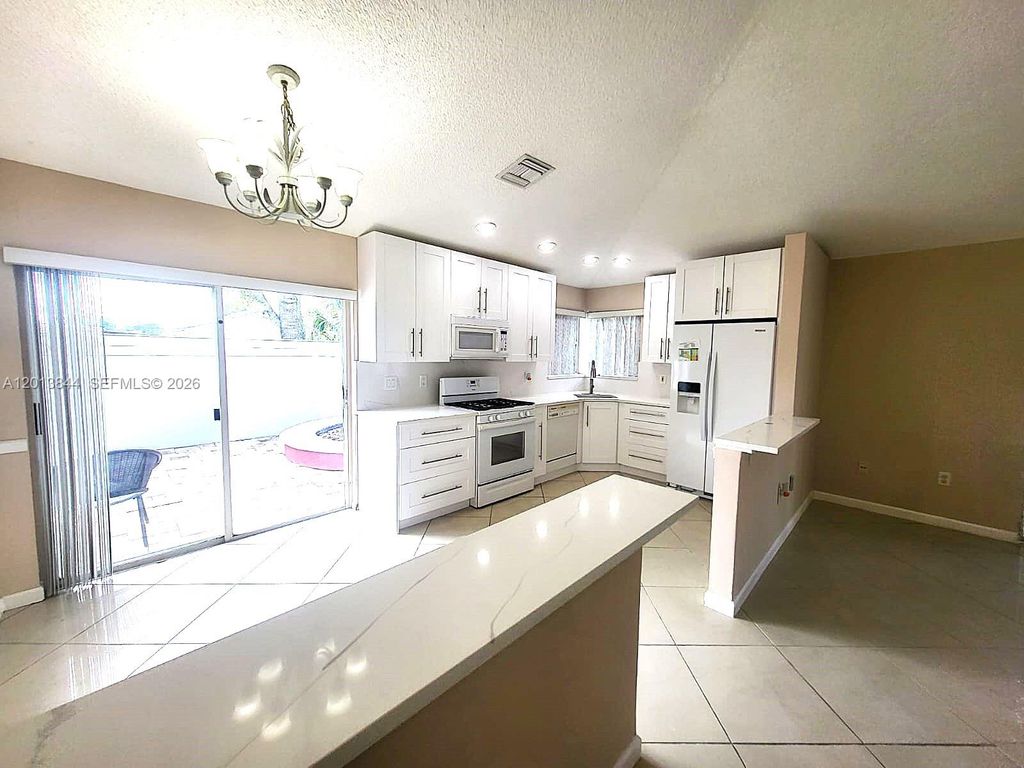 Photo of 13524 NW 5th Ct #0, Plantation, FL 33325 (MLS # A12013844)