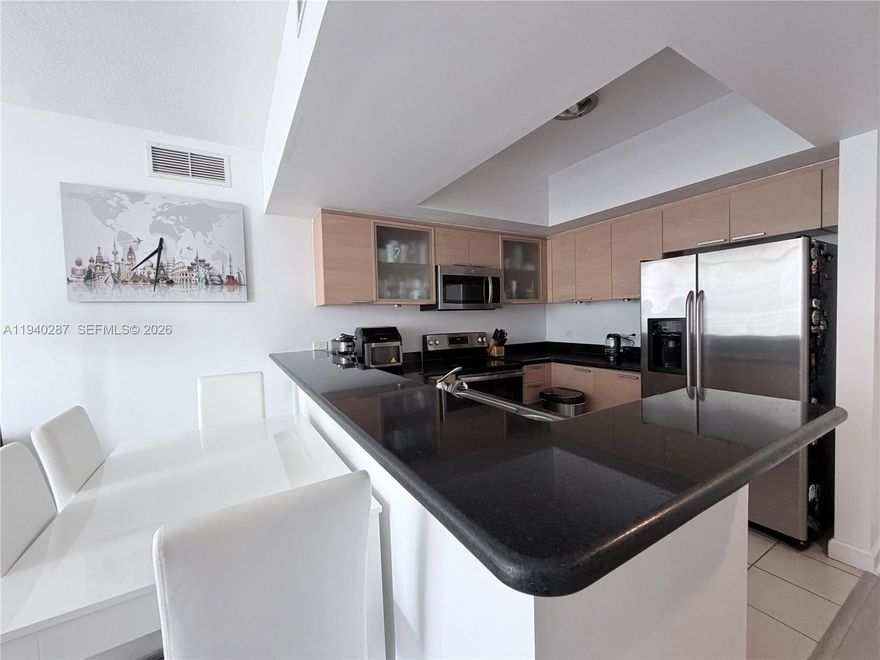 Beautiful, move-in ready, and very bright 2-bedroom, 2-bath residence with two assigned parking spaces in a luxury condominium. Located on the 7th floor, this unit offers an open and airy layout with abundant natural light, a direct pool view, and a private balcony with impact windows. Recently updated with new flooring and a brand-new A/C system.

Building amenities include a heated pool, fully equipped fitness center, billiard and TV room, 24-hour attended lobby, secure package receiving, valet parking, and on-site management. Ideally located in the heart of Hollywood, just minutes from the beach, major highways, shopping, dining, and entertainment. Walking distance to restaurants, banks, markets, and A-rated schools nearby. Ideal for both end-users and investors with strong rental demand in the area