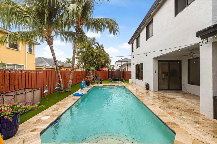Beautiful corner pool home in a desirable neighborhood with no association. Features include a bedroom and full bath downstairs, granite kitchen, separate laundry room, and a partially converted garage ideal as an office or playroom. All doors and windows are impact-resistant. Spacious family areas. Large master suite plus two bedrooms sharing a Jack & Jill bathroom. Enjoy relaxing outdoors by the pool.