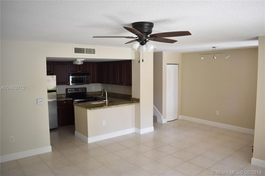 Rarely available 2 story condo! Ready for move in. Granite countertops throughout, tile on the first floor and carpet throughout the stairs and the top floor, all stainless steel appliances and freshly painted. Full laundry room with pantry Space/Storage. Enjoy your living area on the first floor and bedrooms on the second floor. Bright & spacious master bedroom with huge walk-in closet and master bath. Large second bedroom and guest bathroom.