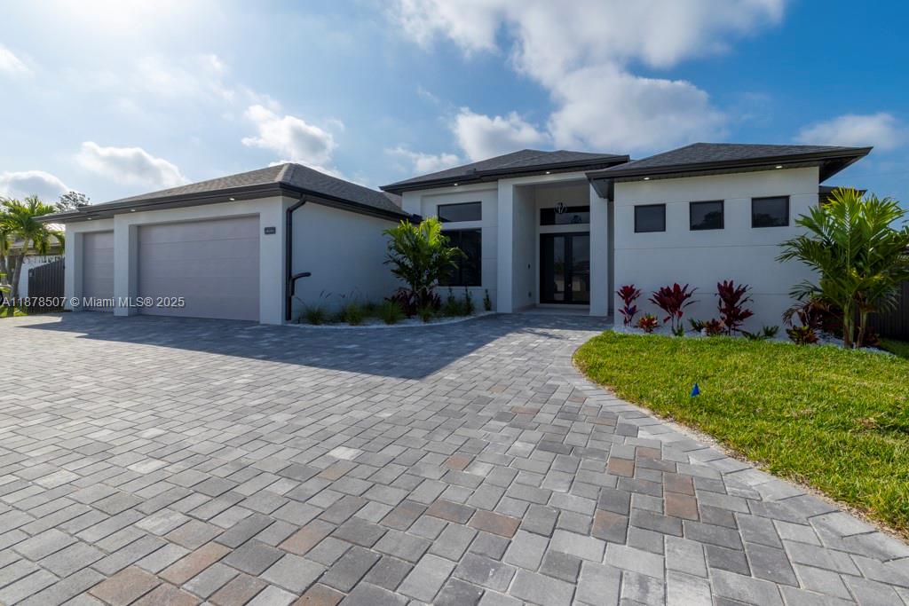 Welcome to your dream home in beautiful Cape Coral!!! This stunning New Construction offer 4 spacious bedrooms,
3 full bathrooms, and a 3 car garage- perfect for families or anyone who loves extra space . Inside, you'll find elegant walk-in closets , a sleek modern kitchen , and your very own built-in bar idealfor entertaining guests or unwinding after a long day.
The open concept lay6out flows seamlessly to your private pool area , cr4eating the ultimate Florida lifestyle . Located in one of Cape Coral 's most desirable neighborhyoods , this home comes with full city utilities (water, seawer and irrigation)