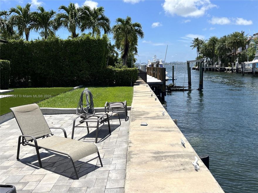 Waterfront Living perfect for boat lovers.  This 4-bedroom, 3-bath single-family home offers a private dock for vessels up to 70 ft in the exclusive gated community of Sans Souci. The residence provides comfort, security, and a relaxed lifestyle with a pool, spacious outdoor entertaining areas, and seamless indoor-outdoor living. Features include new porcelain floors in the living areas and kitchen. Move in, add your personal touch, and enjoy Florida coastal living at its best. Close to top schools, just 10 minutes from the beach, with easy access to Downtown and Miami International Airport. Professional photos coming soon!