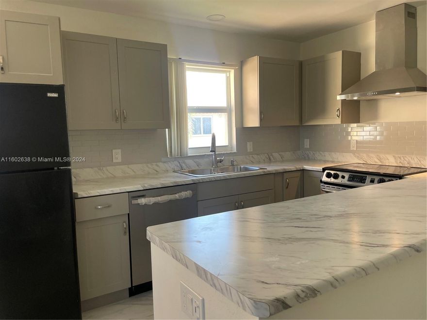 **** BONUS $1,000 TO BUYER'S AGENT THAT BRING FULL PRICE OFFER**** Motivated seller. Fully renovated bijou that combines modern lifestyle with convenience. This unit is a delight of style and functional. The highlights includes: new impact windows and door, updated kitchen and bathrooms, new 2 ton AC, washer and dryer in the unit, upgraded electric panel and more. The open floor plan, refurbished floors, fresh paint throughout the condo, creating an inviting and open atmosphere. Assigned parking and a central location. Both bathrooms have been transformed with new plumbing fixtures, cabinets, and countertops. The renovation extends to the entire unit, including new baseboards, fresh paint, and modern door fixtures, and recessed lighting throughout the entire condo. This is a 55+ community.