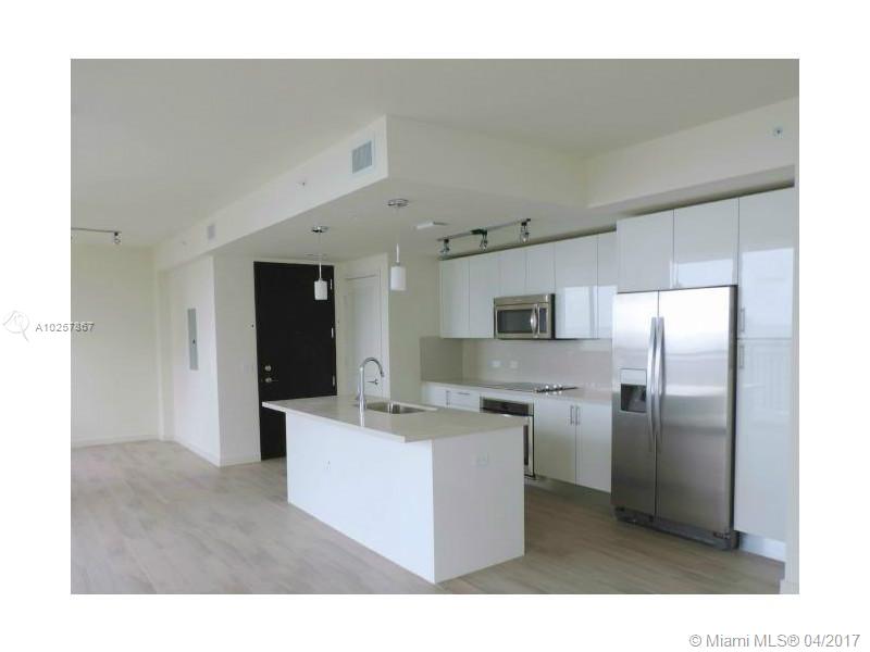 Brand New Building! Live on top of all the Shops, Restaurants, Bars, and Publix of Mary Brickell Village. Unit comes with porcelian flooring and built out closets! Open floor plan corner unit with spacious den and great water views. Enjoy the 1 acre amenity deck at Nine with a gym, party room, pool and pet area.