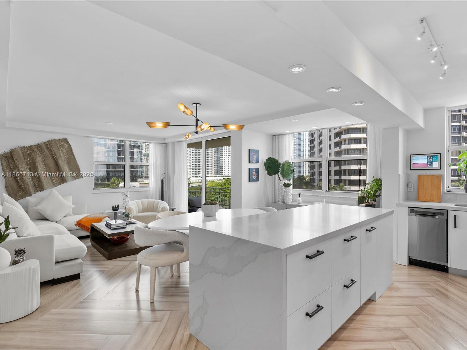 Exquisite 2/2 fully furnished turnkey corner residence with stunning Bay and City views. Fully renovated with new plumbing, electrical, and lighting throughout, this home features custom built-ins, a sleek and functional kitchen w/ a Bar, custom closets, windows sheers and black-out w/ side channels, and new impact sliding balcony door.
Located on the prestigious private island of Brickell Key, offering beautiful landscaping, restaurants, café, marketplace, dog park, jogging path, and more. The building has been completely remodeled, with a fantastic new pool, BBQ, and spacious Deck. Enjoy resort-style living with 24-hour concierge, valet, security, tennis courts, heated pool & spa, waterfront new gym, club room, business center & more. Includes two assigned parking spaces.