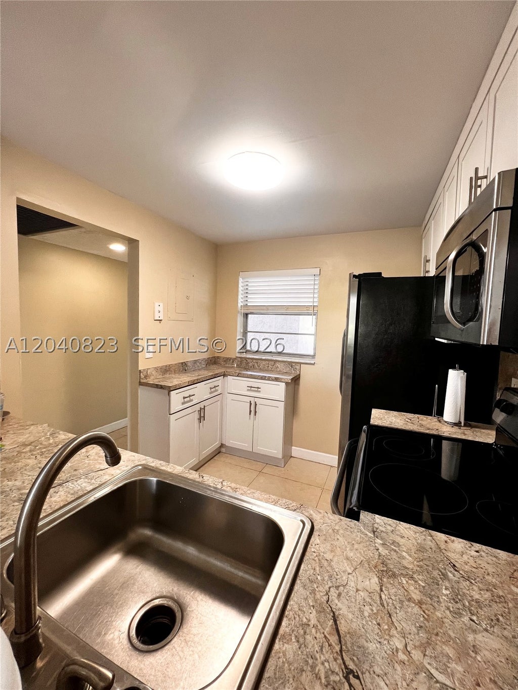 Photo of 9235 Lagoon Pl #109, Davie, FL 33324 (MLS # A12040823)