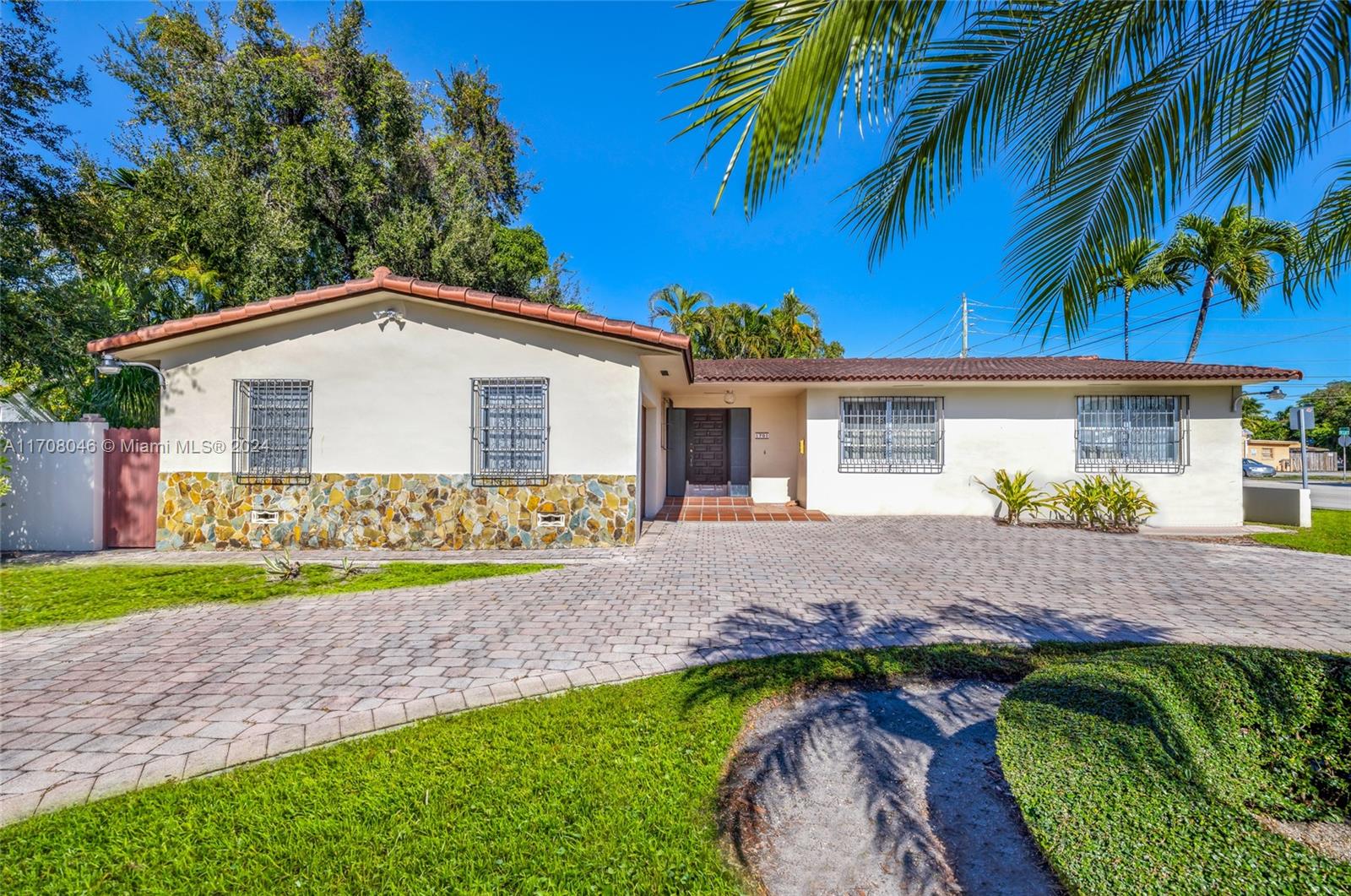 This is a 2,146 sq.ft home consisting of 3 bedroom 2 bath, a 1 car garage, & w/a unique music studio that was built into the existing living room. This is a vintage 1970 home that could be renovated to meet the needs of any family. Alternatively, this exceptional 7,950 sf lot offers a unique opportunity to develop a new single-family home, or for aspiring investors/developers the T3-O zoning does allow for development of a duplex. The existing home makes this a solid covered land play and can be rented for income. Nestled in a vibrant neighborhood, it provides unparalleled convenience to downtown Miami, Brickell, Coral Gables, and Miami Beach, ensuring easy access to dining, shopping, and entertainment options. Don’t miss this rare opportunity to develop in a prime Miami location.