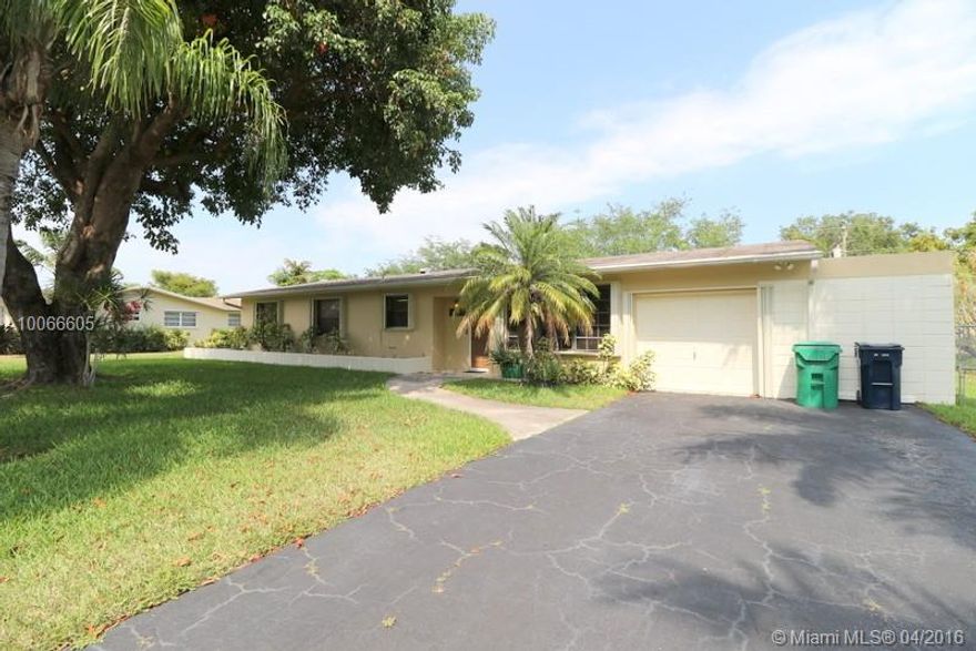 REDUCED!!!!Make a move to this maintained 4/3 in desirable Palmetto Bay on a builder's 1/2 Ac lot. Accordion shutters for all window and door openings. Open floor plan and split floor plan with 2 master bedrooms. Florida room and large screened patio/porch with tile floors, windows and hot tub.  One car garage and large shed for extra storage.  Fenced back yard and lawn sprinklers on a well.