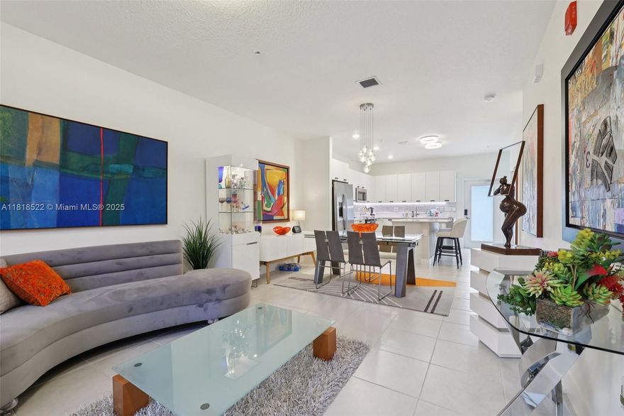 Motivated seller!  Beautifully upgraded, almost new (Build 2023), 2-story home featuring 4 bed & 3 full bath, a bright, open-concept living area perfect for family living and entertaining. Step to charming covered entry into a light-filled space that includes a spacious living room, One bedroom & Full Bath on the main level & a modern kitchen with a large island, sleek backsplash, and stainless-steel appliances. Upstairs, the master suite & guest room boasts a custom Elfa closet system, a luxurious updated bathroom. Home is loaded with upgrades, including high-impact doors, modern ceiling lamps, designer blinds & a full Ring security system for peace of mind. Just minutes from City-Place Doral, Main Street dining, Downtown Doral Charter Schools, U-Health Center, close to 826 Expressway.