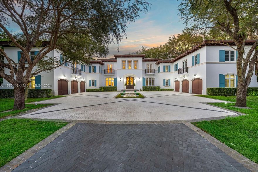 Palatial Neoclassical Estate on 1.2 park-like acres in guard-gated Snapper Creek Lakes! A perfect blend of classic and modern design, this entertainer's dream features an enormous entertainment wing with bar, media room, billiards room, and wood-paneled office. A separate wing is comprised of a movie theater and a private guest suite. Upstairs, you'll find 5 large bedrooms and the 4000sf master wing w/ gym (could be 9th bedroom), dual closets, luxurious master bath, large sitting room/office, and expansive terraces. Resort-style amenities include pool, summer kitchen, and cabana bath w/outdoor shower. Also, separate staff/in-law quarters and oversized garages for 6 cars. Includes access to a 40ft boat slip in Snapper Creek Marina.