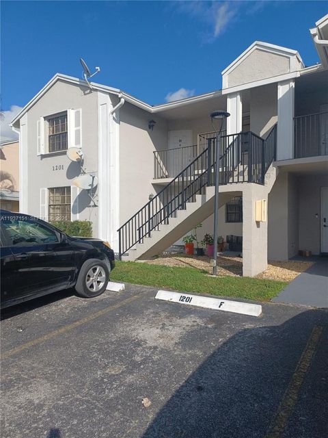 Photo of 1201 N Liberty Ave #1201E, Homestead, FL 33034 (MLS # A11937151)
