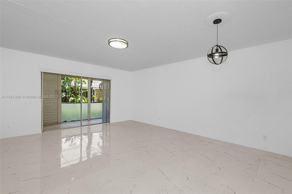 Photo of 218 NE 12th Ave #107, Hallandale Beach, FL 33009 (MLS # A11451396)