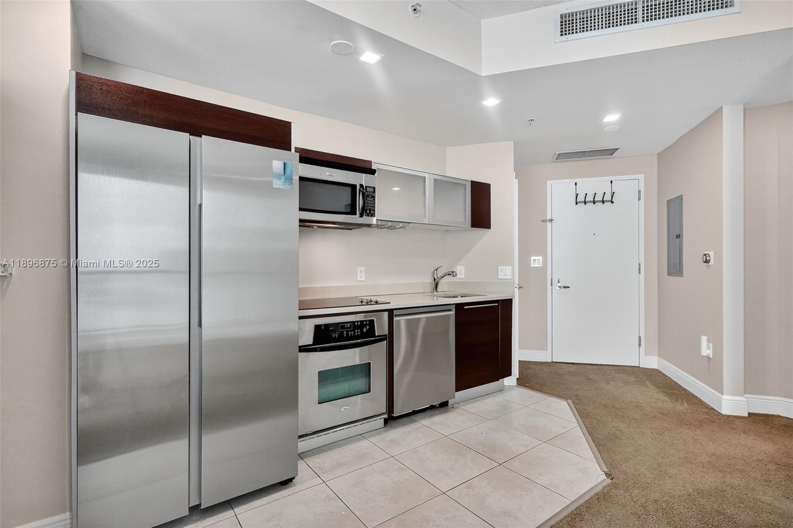 BEST PRICED UNIT IN THE BUILDING. Experience urban luxury in this oversized Edgewater studio with panoramic water views that photos don't make justice. The home features a full-size kitchen with stainless steel appliances, in-unit washer/dryer, fully electric blackout shades, a huge walk-in closet, and a wrap-around balcony perfect for relaxing. HOA covers water, cable, and internet, plus one assigned parking space. Enjoy top-tier amenities: state-of-the-art gym, two pools, coworking space, sauna, on-site convenience store, valet parking, 24-hour concierge and more. Located across from Margaret Pace Park, close to restaurants and shops.