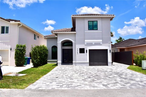 Photo of 7963 NW 195th Ter, Hialeah, FL 33015 (MLS # A12009319)