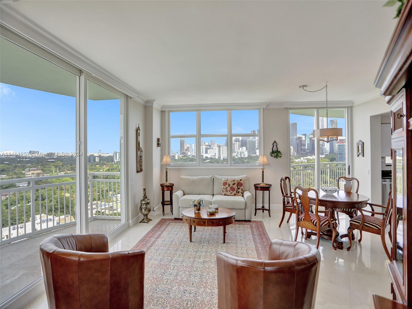 Spectacular Brickell and Downtown views from this completely renovated, northern-exposure, corner unit. Largest 2-bed floor plan with private, unobstructed, breathtaking sunset and bay views. Renovations include marble floors, baths, kitchen and appliances, custom closets and cabinets, high-end lighting and plumbing fixtures, crown molding, custom window shades (electric blackout shades in bedrooms). Newer building construction on the southern end of Brickell Avenue, adjacent to the Rickenbacker Causeway, with convenient access to major highways and transportation. Building features full-time, on- site management, 24-hour security, concierge, valet, and maintenance staff. Amenities include pool, spa, sauna, gym, tennis court, media lounge and club rooms. Storage, 2 covered parking spaces.