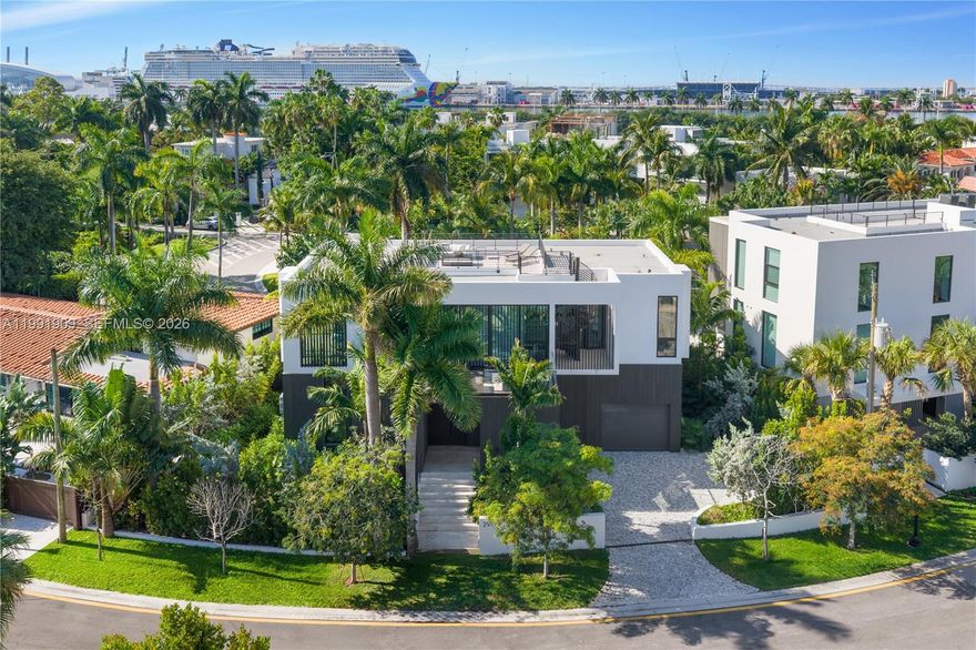 Brand-new architectural masterpiece on the exclusive, guard-gated Palm Island. This stunning 4-bedroom, 4.5-bath residence offers 3,077 square feet of modern luxury with an open-concept layout, custom Italian kitchen and closets, seamless indoor-outdoor living, and a sleek contemporary pool surrounded by lush tropical landscaping. A 370-square-foot rooftop terrace delivers breathtaking water, skyline, and sunset views. Palm Island offers 24/7 Miami Beach police security, gated entry, tennis and basketball courts, and a children’s playground. Conveniently situated just minutes from MIA Airport and the best dining and social scenes in South Beach, the Design District, and Downtown.