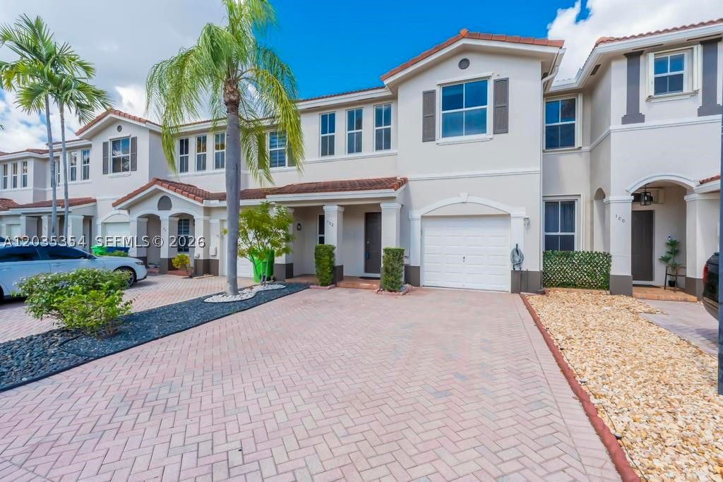 Photo of 102 Riverwalk Cir #102, Sunrise, FL 33326 (MLS # A12035354)